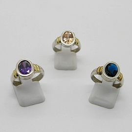 ANILLO CON PIEDRA OVAL /PLATA Y ORO